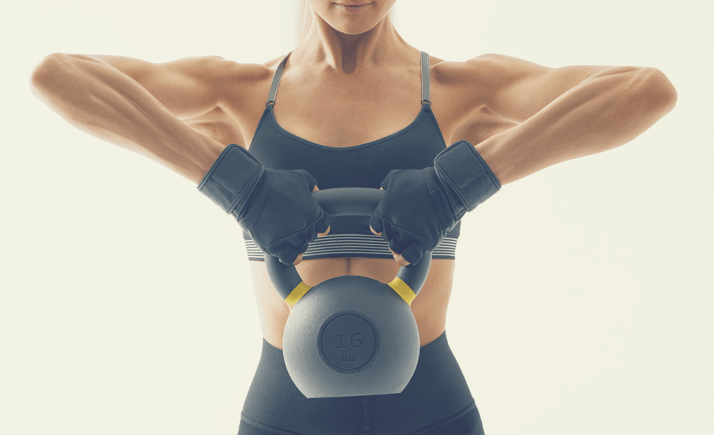 How To Safely Lose Weight Fast Part II: The Exercise Choices Fit woman doing kettlebell exercises.