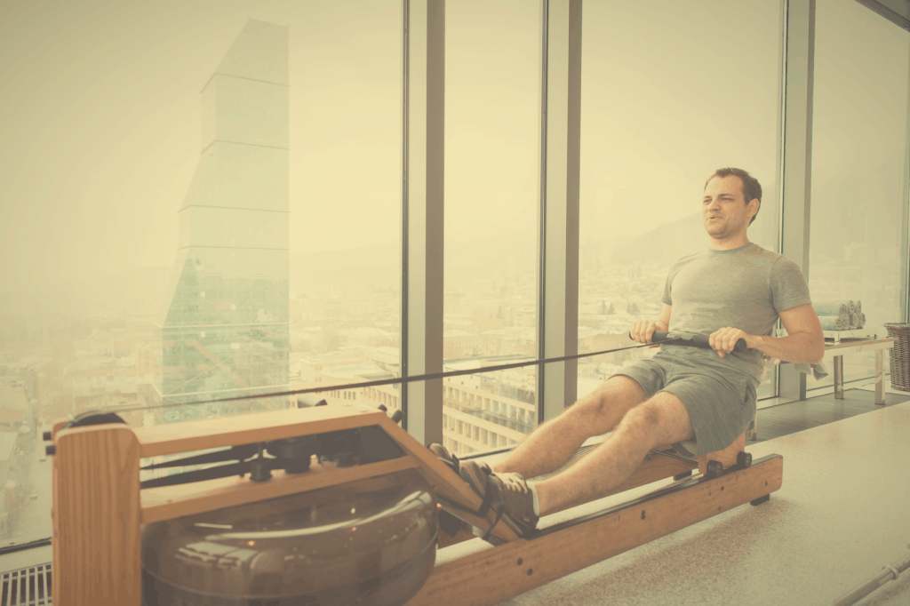 Best Home Rower Man working out at home on a WaterRower machine